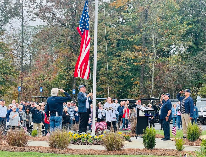 Honor Flight in Veterans Day Festivities flag